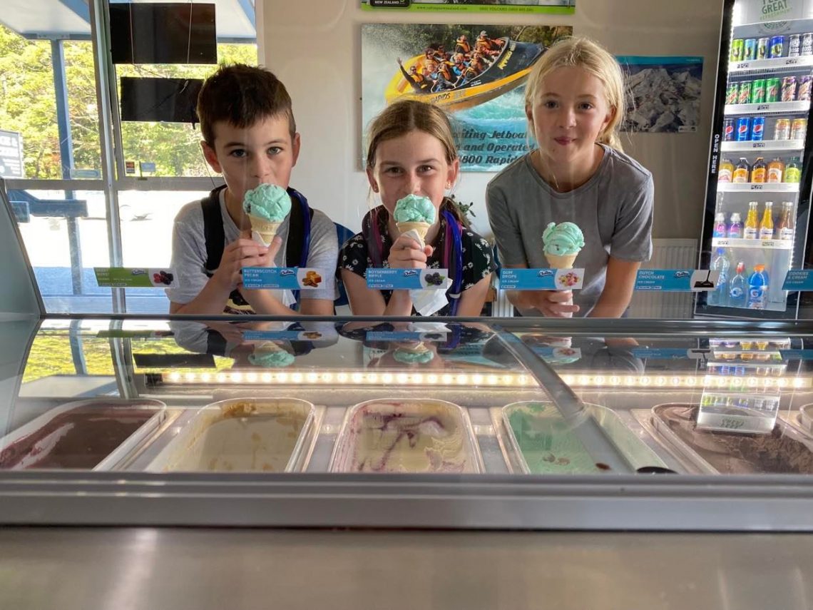 Children enjoying scooped ice cream at LKNZ Lodge & Cafe in Ohakune